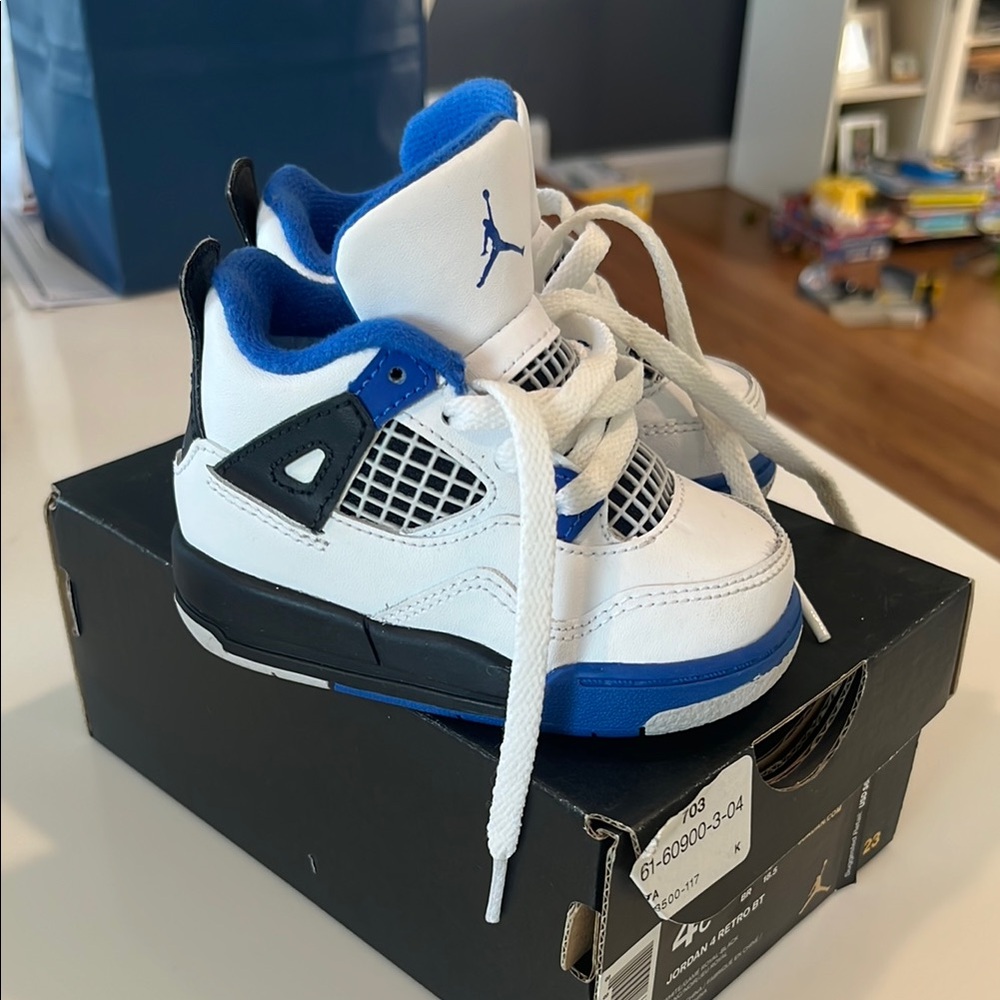 Kids Jordan White and Blue retro sneakers